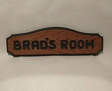 Insegna in legno stanza di