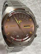 Orologio da uomo ORIENT automatico calendario perpetuo quadrante arancione 46...