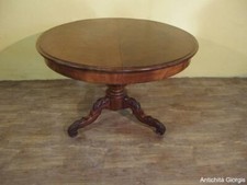 TAVOLO ROTONDO IN PIUMA DI MOGANO.