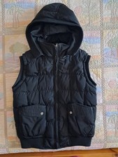 Piumino smanicato con cappuccio e zip nero Tg S