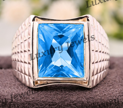 Anello uomo lusso topazio blu