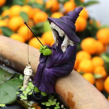 Scultura di streghe da pesca