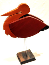 Bambola uccellino in legno in