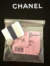 Bottone CHANEL motivo viso