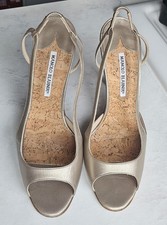 Manolo Blahnik oro tacco a