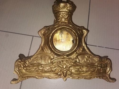 Antica fusione dorata orologio - fusione,