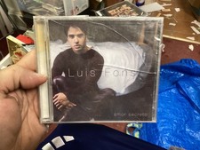 LUIS FONSI AMOR SECRETO BRAND
