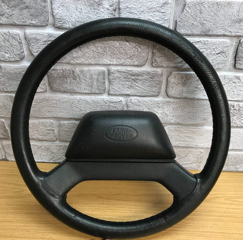 Volante pelle nera - in,