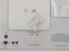 Orecchini in oro  bianco 9 kt con cuori zirconi. 