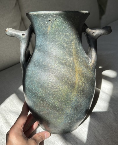 Scarso vaso ceramica testa