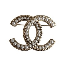 Spilla Chanel tono oro finta