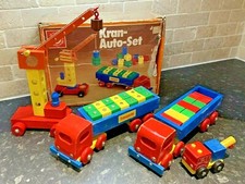 Gru in legno colorata Heros