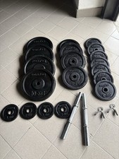 dischi ( 4 Da 10kg + 4 Da 5 Kg + 6 Da 2kg + 4 Da 1kg) 2 Manubri