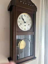 Antico orologio da parete