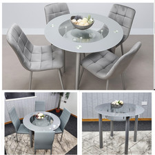 Set tavolo da pranzo rotondo moderno in vetro grigio con 4 sedie - ecopelle o velluto