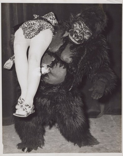 Sideshow gorilla man carries - sideshow,