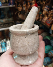 Antico macina mortaio e