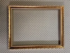 Cornice di legno dorata -