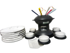 Set Fonduta in ghisa per 6 persone con piatti in ceramica, forchettine colorate,