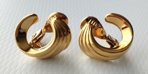 Orecchini clip curvi oro - a,