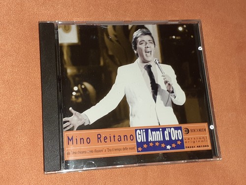 Mino reitano gli - ,