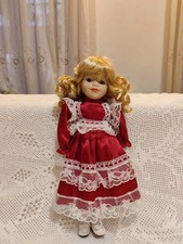 Porcelain doll with carillon