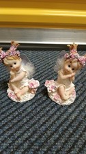 Coppia di statuine fatate