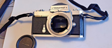Nikon Nikkormat FT Argento Fotocamera 35 mm  buone condizioni tracolla e tappo