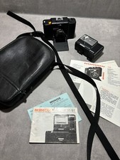 Minox 35 ML con flash e