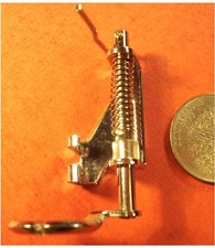 Piedino in metallo con piedino