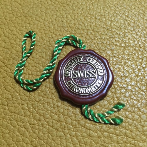 Rolex red tag seal hologram - red,