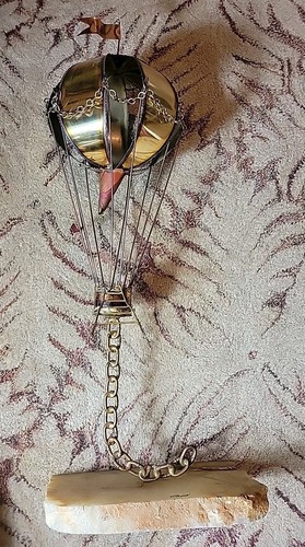 Scultura uccellini mongolfiera
