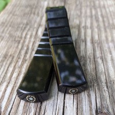 Rosario in ebano con spille