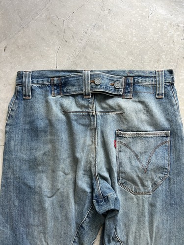 Fibbia jeans intrecciata