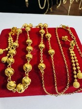 Orecchino e collana sfere