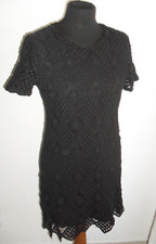 PARTICOLARE  VESTITO