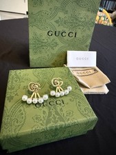 Orecchini Gucci GG dorati con
