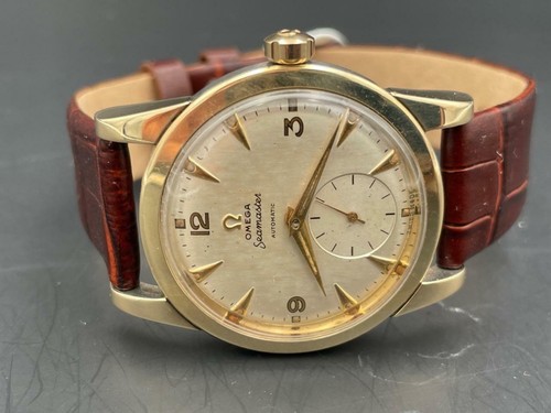 1950 gold capped omega - gold,