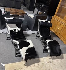 Pair of Le Corbusier LC4 Hide