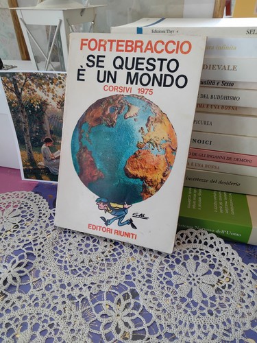 Questo mondo corsivi - se, un