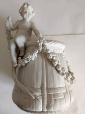 scultura In ceramica Putto