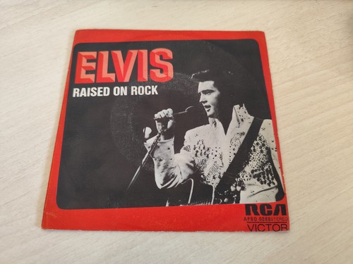 Elvis presley raised - -, rock