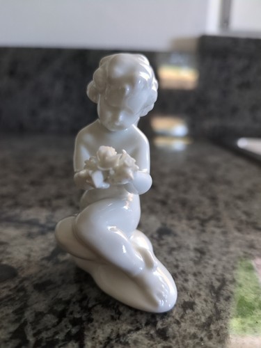 Angioletto con fiori statuetta - angioletto,