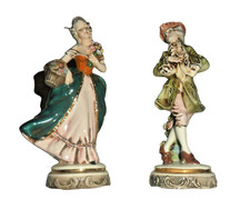 Rara  Coppia di statuette in
