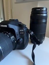 macchina fotografica reflex Canon D80 con tre differenti obbiettivi