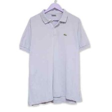 Polo Lacoste azzurra tinta
