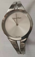 NUOVO OROLOGIO AL QUARZO KELVIN KLEIN  CON QUADRANTE ARGENTO SERIE K1W2M1...