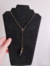 Collana croce insolita