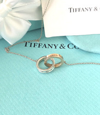 Collana Tiffany & Co. 1837 Rubedo e Argento Cerchi Incastro Ciondolo 16"