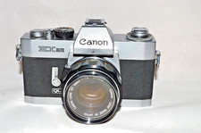 Canon EX AUTO QL con obiettivo Canon EX 1:1.8 50mm "NUOVE GUARNIZIONI, TESTATE" (C-18)